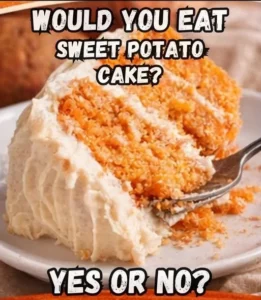 Delicious Sweet Potato Cake with Creamy Frosting served on a plate